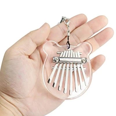 Imagen de Alnicov piano de pulgar Kalimba 8 teclas, dedo acrílico transparente Super MiNi con cordón, adecuado para principiantes en cumpleaños, Navidad y otras ocasiones (forma oreja oso)