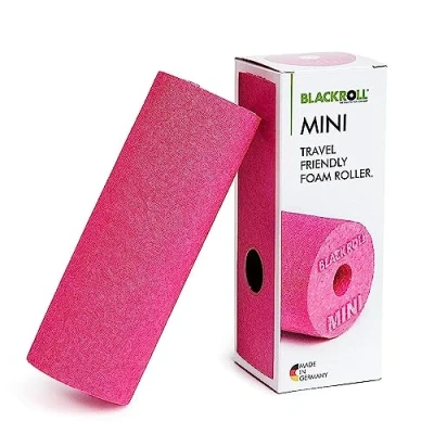 Imagen de rodillo para salpicadero BLACKROLL® MINI El original. pequeño de automasaje la fascia en color rosa.