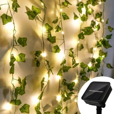 Imagen de Guirnaldas Luces Exterior Solares,Guirnalda de Hiedra Artificial,10M 100 LED Guirnalda Solar Impermeablet, 8 Modes Cadena Luces,Luces Solares Impermeable para Jardín, Patio, Fiesta