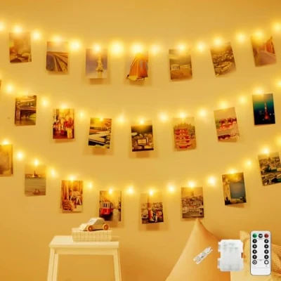 Imagen de CNMTCCO Cadena de 100 luces LED con clip para fotos, 10 m, funciona pilas, 50 clips colgar control remoto, 8 modos hadas, dormitorio, boda, fiesta,