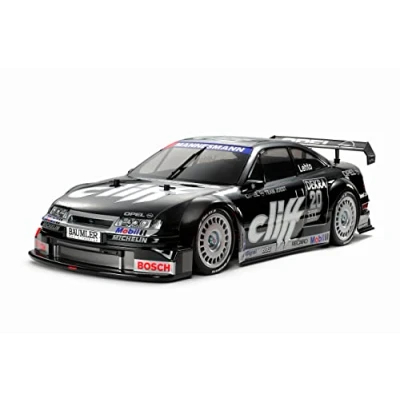 Imagen de Tamiya 58701 1:10 Opel Calibra V6 Cliff (TT 01E) Coche teledirigido, vehículo RC, modelismo, Kit para Montar, Hobby, Manualidades, Multicolor