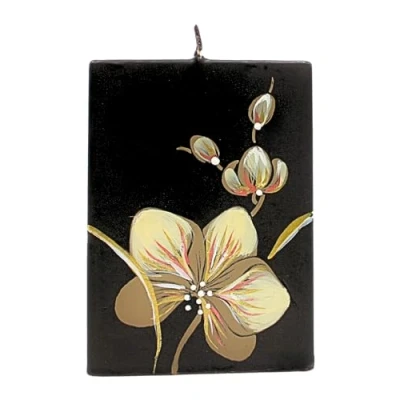 Imagen de Vela negra con orquídea clara, hecha y pintada a mano, tamaño aprox. 9 x 5 12 cm