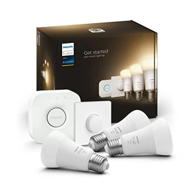 Imagen de Philips Hue Bombilla Inteligente, A60 E27, Luz Blanca Cálida regulable, 10.5W, Compatible con Alexa y Google Home Pack de 3 Bombillas LED inteligentes + Botón Inteligente Bridge