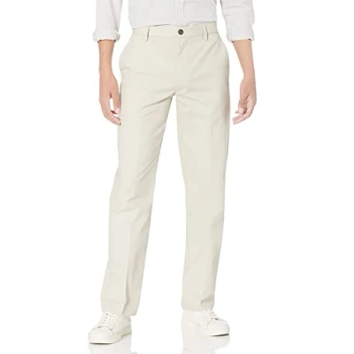 Imagen de Amazon Essentials Pantalón Chino con Parte Delantera Plana, Resistente a Las Arrugas y de Corte clásico (Disponible en Tallas Grandes Largos Especiales) Hombre, Piedra, 32W / 31L