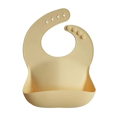 Imagen de mushie Babero de Silicona para Bebés Baberos Alimentación con Bolsillo Fáciles Lavar 4 Tamaños Ajustables Sin BPA Accesorio Durable Niños Pequeños y Niñas Sunshine