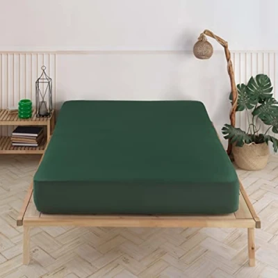 Imagen de Vency sábana bajera ajustable de punto premium 140 x 200 cm, verde oscuro, 100 % algodón, a 35 cm altura del colchón color oscuro
