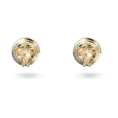 Imagen de Swarovski Pendientes de Botón Stilla, con Circonitas Talla Trilliante, Baño en Tono Oro, Amarillo Ámbar, la Colección Stilla