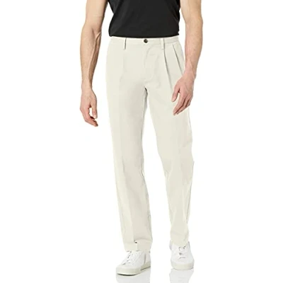 Imagen de Amazon Essentials Pantalón Chino Plisado, Resistente a Las Arrugas y de Corte clásico (Disponible en Tallas Grandes Largos Especiales) Hombre, Piedra, 33W / 29L