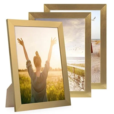 Imagen de PHOTOLINI Marco A4 21x30 cm oro madera MDF, set de 3 marcos anchos, moderno, cristal acrílico sólido, para colgar y poner pie, accesorios adicionales una decoración elegante su pared