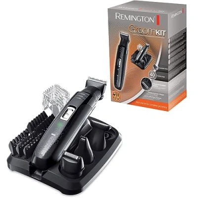 Imagen de Remington Recortadora de Barba y Cortapelos Groomkit Barbero Máquina Cortar Pelo Inalámbrico, Revestimiento Titanio, 10 Accesorios, Base Almacenamiento, 40 min Autonomía PG6130