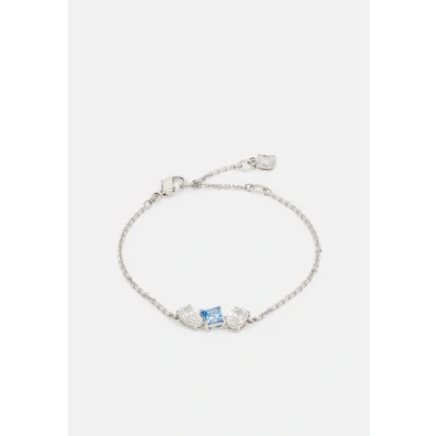 Imagen de Swarovski Pulsera Mesmera, con Trio de Cristales Zirconia, Cristal Central Azul, Baño Rodio