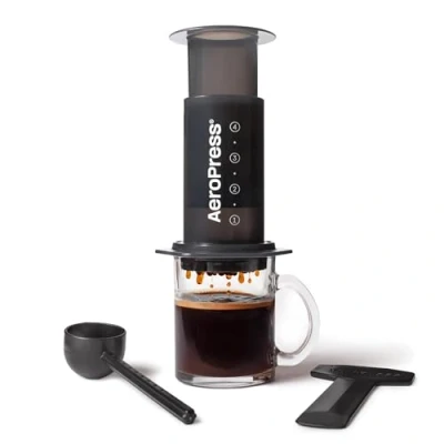 Imagen de AeroPress Cafetera Original Máquina de Café y Espresso Portátil Nivel Barista con Cámara, Émbolo Filtros Preparación Rápida