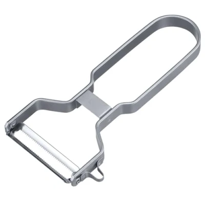 Imagen de Westmark 609422E1 Pelador con Hoja Dentada, óptimo para Pelar Tomate, Kiwi, Mango, Pimiento y Más, Usuarios Diestros Zurdos, Acero Inoxidable