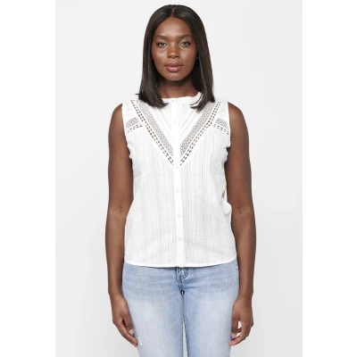 Imagen de Blusa sin mangas de algodón con cuello redondo y cierre delantero botones detalles bordados color blanco para mujer Moda Actual