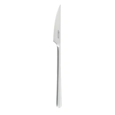 Imagen de Arcos Serie Milano Cuchillo Chuletero para carne Monoblock de una pieza en Acero Inoxidable Hoja serrada 100 mm Apto Lavavajillas 3 Espesor Color Plata