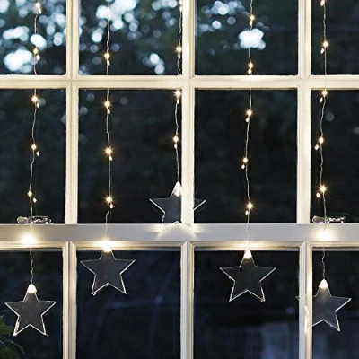 Imagen de Lights4fun Cortina de 47 Micro LED Blanco Cálido para Interiores en Alambre con Estrellas