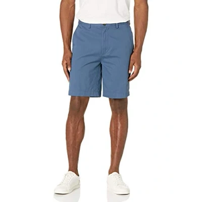 Imagen de Amazon Essentials Pantalones Cortos Chinos de 23 cm con Corte Clásico Hombre, Azul Intenso, 33W