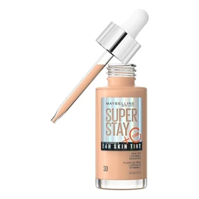 Imagen de Maybelline New York,Base de maquillaje enriquecida con Vitamina C, Hasta 24H, Acabado luminoso, Superstay Skin Tint, Tono 30