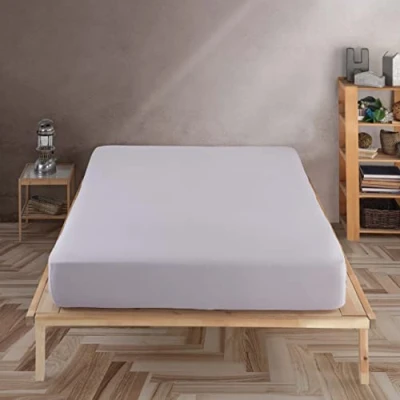 Imagen de Vency sábana bajera ajustable de punto premium 140 x 200 cm, gris claro, 100 % algodón, a 35 cm altura del colchón color claro