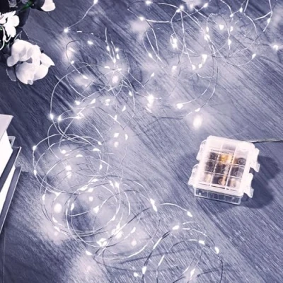 Imagen de Ariceleo Guirnalda de Luces LED 5m, 1 Paquete 50 Hadas a Pilas, Alambre Cobre Blanco con Remoto, Temporizador &amp; Modo Centelleante, Ideal para Exterior, Dormitorio, Bodas, Navidad