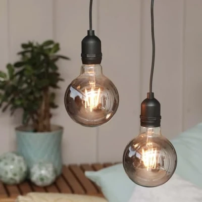 Imagen de Hellum set de 2 lámparas colgantes vintage para exterior, retro gris ahumado con temporizador y regulador intensidad, cristal redondo G95 Ø 9,5 x 13,7 cm 151442