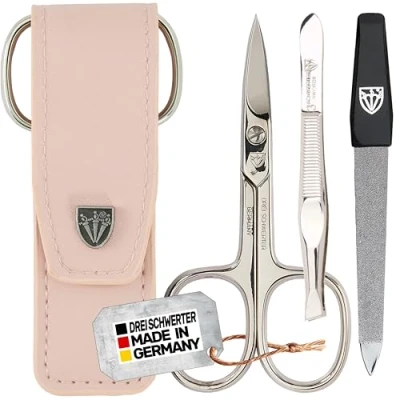 Imagen de DREI SCHWERTER Juego de manicura y pedicura 3 piezas en estuche piel sintética, color rosa. Fabricado Alemania. Contenido: tijeras uñas, pinzas, lima uñas zafiro