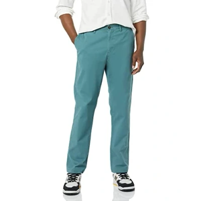 Imagen de Amazon Essentials Pantalón Chino Elástico Informal Corte Deportivo (Disponible en Tallas Grandes y Largos Especiales) Hombre, Verde Oscuro, 36W / 31L