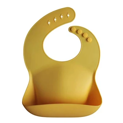Imagen de mushie Babero de Silicona para Bebés Baberos Alimentación con Bolsillo Fáciles Lavar 4 Tamaños Ajustables Sin BPA Accesorio Durable Niños Pequeños y Niñas Mineral Yellow