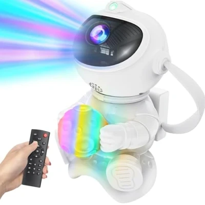 Imagen de PKBD Astronauta Proyector de Galaxias y Estrellas, Luz Nocturna Infantil LED, Lámpara con 8 Efectos Nebulosas, 7 Modos Luces LED en el Pecho, Altavoz Bluetooth Integrado, Ideal para Regalos Luna