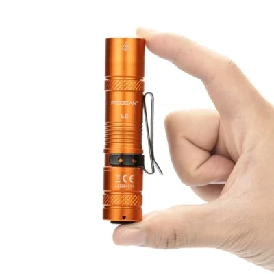 Imagen de PIOOCAN linterna pequeña con batería, 1200 lúmenes, para EDC, recargable, 4 modos, mini muy brillante, camping, pesca, senderismo, reparación y emergencia (naranja)