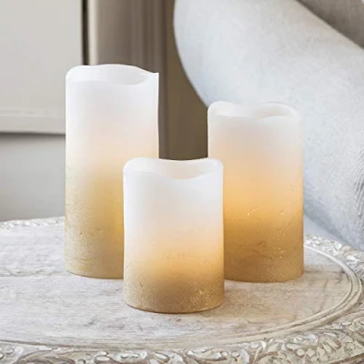 Imagen de Lights4fun Juego de 3 Velas Pillar LED a Pilas en Cera Blanca con Efecto Ombré Dorado