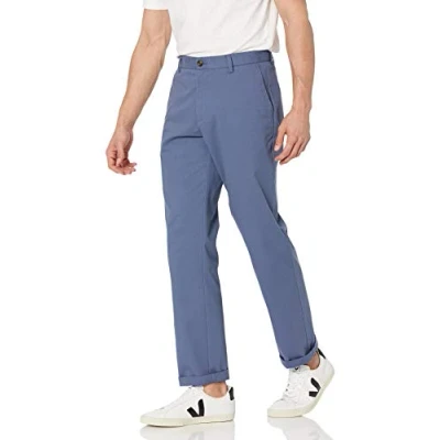 Imagen de Amazon Essentials Pantalón Chino con Parte Delantera Plana, Resistente a Las Arrugas y de Corte clásico (Disponible en Tallas Grandes Largos Especiales) Hombre, Añil, 34W / 30L