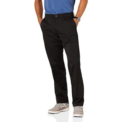 Imagen de Amazon Essentials Pantalón de Golf Elástico Ajuste Clásico (Disponible en Talla Grandes y Largos Especiales) Hombre, Negro, 32W / 33L