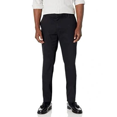 Imagen de Amazon Essentials Pantalón chino elástico de corte ajustado, resistente a las arrugas, con parte delantera lisa Hombre, Negro, 31W / 34L