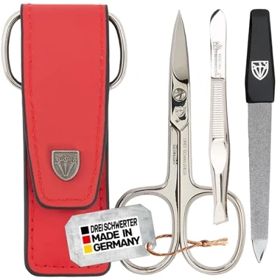 Imagen de DREI SCHWERTER Juego de manicura y pedicura 3 piezas en estuche piel auténtica, color rojo. Fabricado Alemania. Contenido: tijeras uñas, pinzas, lima uñas zafiro