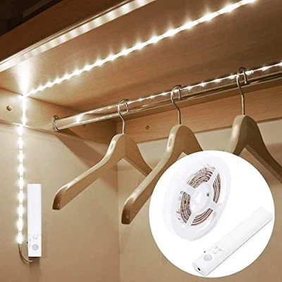 Imagen de OriFiil Tira LED Pilas, 2M Luces Strip Light, Luz Armario Sensor Movimiento, 6000K Blanco Frío Nocturna para Infantil Habitacion, Debajo Cama, Pasillo, Baño, Cocina, Escaleras