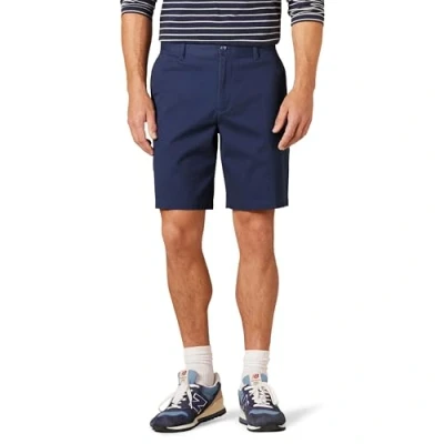 Imagen de Amazon Essentials Pantalones Chinos elásticos cómodos de Corte clásico, Tiro 22 cm Hombre, Azul Marino, 29W