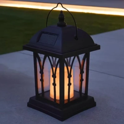 Imagen de Festive Lights Farol de jardín con vela, funciona energía solar, efecto parpadeante, LED color ámbar, 27 cm