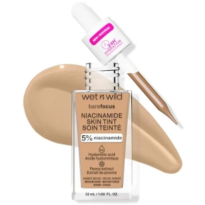 Imagen de Wet n Wild Bare Focus Niacinamide Skin Tint, Base de Maquillaje Cobertura Modulable, Fórmula Ligera Enriquecida con Ácido Hialurónico y Vitamina E para un Look Radiante, Amber Beige