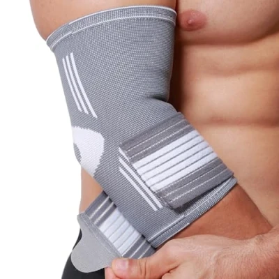 Imagen de NEOtech Care Codera ancha de sujeción Tejido ligero, elástico y transpirable Tira compresión ajustable Marca Gris (Talla S, 1 Unidad)
