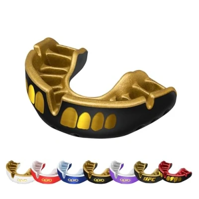 Imagen de protector bucal OPRO Gold Level Grillz, deportivo para niños, con tecnología de ajuste revolucionaria UFC, boxeo, MMA, artes marciales, BJJ, (Negro/Oro, Adulto)