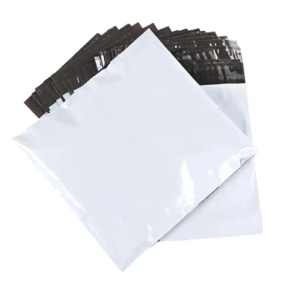 Imagen de 100 Bolsas para Envíos 32x42 cm. Sobres Plásticos Blancos Opacos Autoadhesivos. de Embalaje Impermeables y Resistentes, Ropa, Libros, Zapatos Paquetes Correo