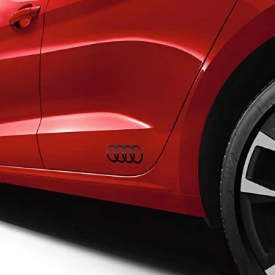 Imagen de Audi 8W0064317FY9B Lámina Decorativa de Anillas con Logotipo en Negro Brillante