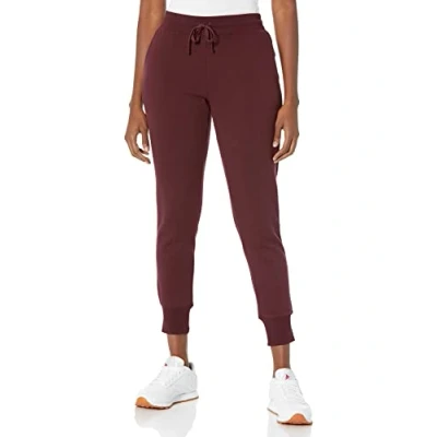 Imagen de Amazon Essentials Pantalones De Correr Forro Polar con Puños (Disponibles En Tallas Grandes) Mujer, Burdeos, XS