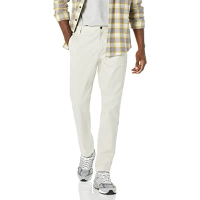 Imagen de Amazon Essentials Pantalón de Trabajo Elástico Corte Ajustado y Resistente a Las Manchas Arrugas Hombre, Marrón Caqui Claro, 32W / 31L