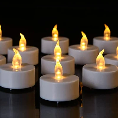 Imagen de HANZIM 50 unidades LED velas CR2032 Pilas sin Llama,Velas de té,Velas LED,Velas parpadeantes Artificiales realistas a con luz Amarilla cálida (50 PACK)