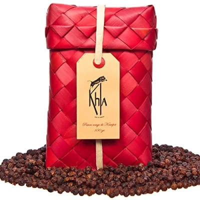 Imagen de KHLA Pimienta roja de Kampot Premium IGP 100 g en Grano Sobre Procedente la Agricultura Ecológica Embalaje Tradicional Hojas Palma