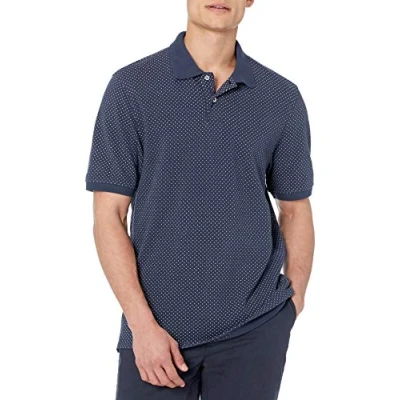 Imagen de Amazon Essentials Polo en piqué de algodón con Corte Regular (Disponible Talla Grandes y Largos Especiales) Hombre, Azul Marino Blanco Lunares, XS