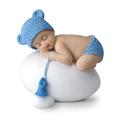Imagen de Figura niño bebé azul durmiendo sobre huevo,7,5x8cm.