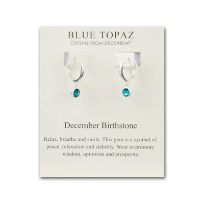 Imagen de Aretes tipo argolla con piedra natal de diciembre creados cristales topacio azul Zircondia®